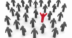Red man standing out in a sea of grey men