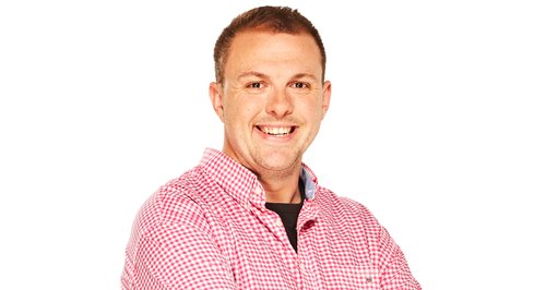 Daniel Fox standing on a white background
